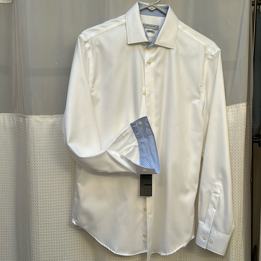 Andrew Marc white dress/casual shirt with light blue roll back cuffs.